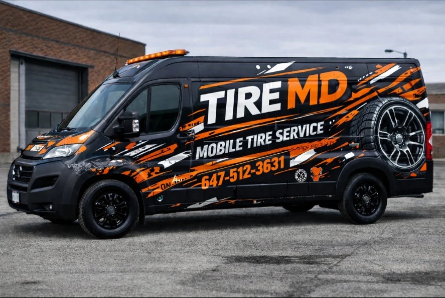 Tire MD black and orange mobile tire service van